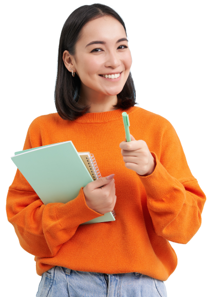 Smiling student holding a notebook