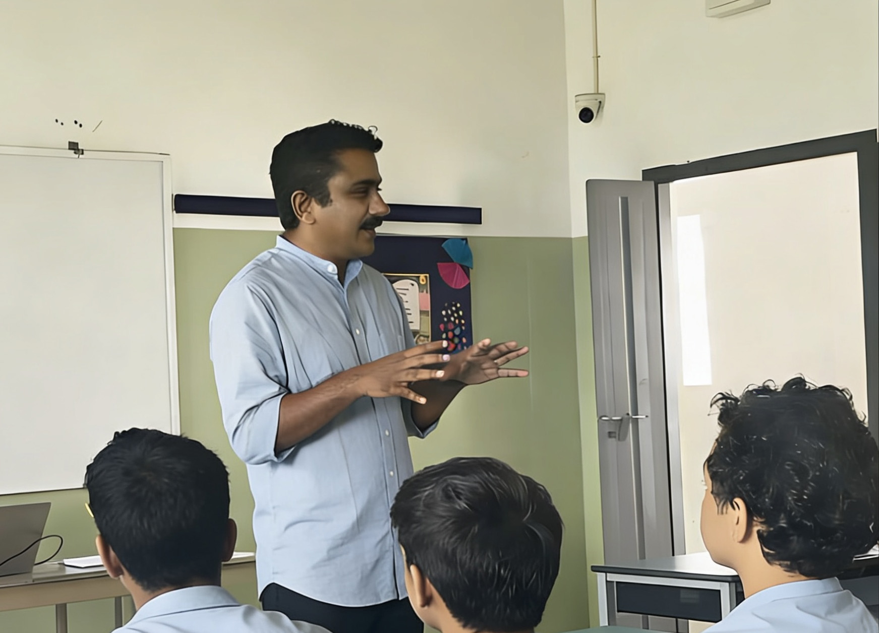 Teacher engaging students in classroom